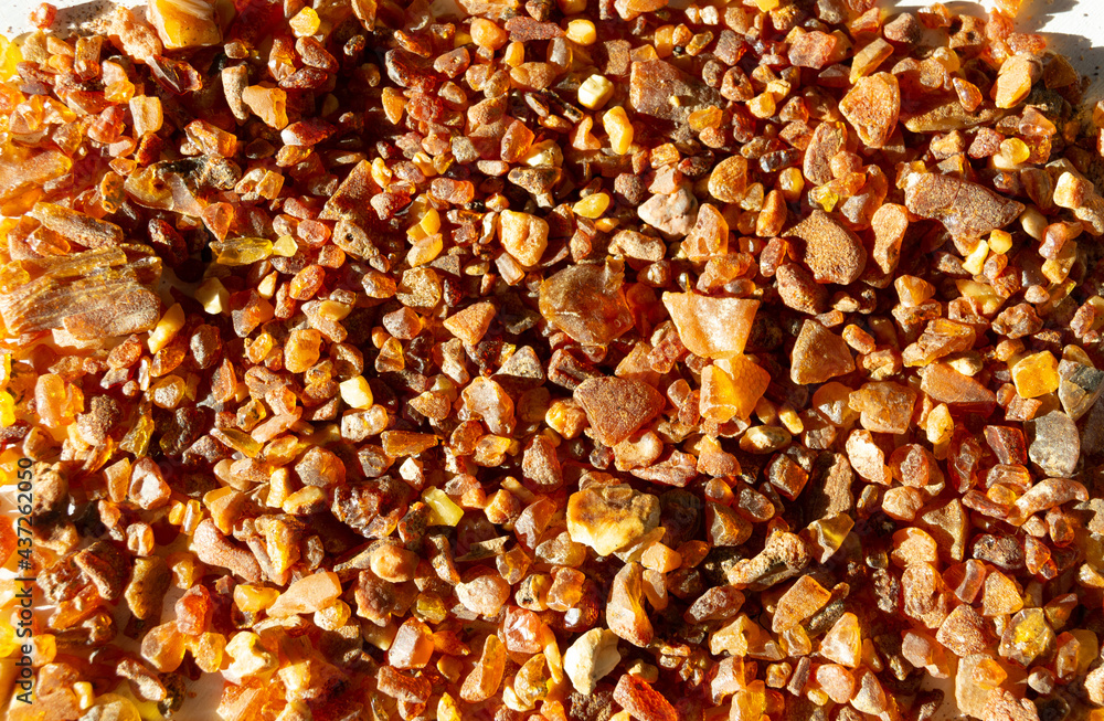 texture of natural amber stones in sun light texture of natural amber stones in sun light