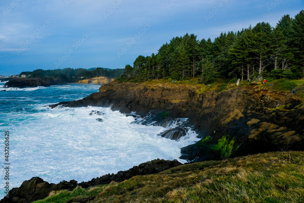 Ocean waves crashing,Rocky coast and beach with ocean surf, Oregon Coast, USA