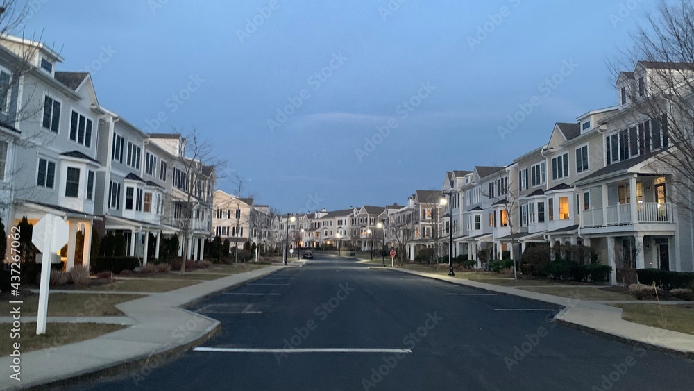Hingham Shipyard condos in the sunset, Streets lit by streetlights
