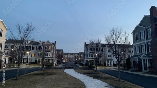 Hingham Shipyard condos in the sunset, Streets lit by streetlights photo