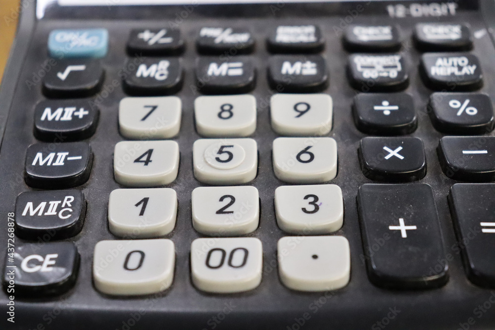 close up capture of calculator machine close up capture of calculator machine