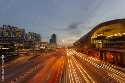 Kuala Lumpur, Malaysia - May circa 2021: Transportation rush at night through the Bukit Bintang intersection in the Kuala Lumpur City Center photo