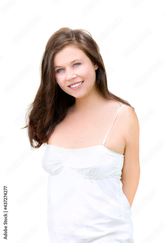 Portrait of a beautiful young smiling woman with her hands on her back, closeup in front of white studio background Portrait of a beautiful young smiling woman with her hands on her back, closeup in front of white studio background