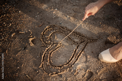 heart drawing in the sand