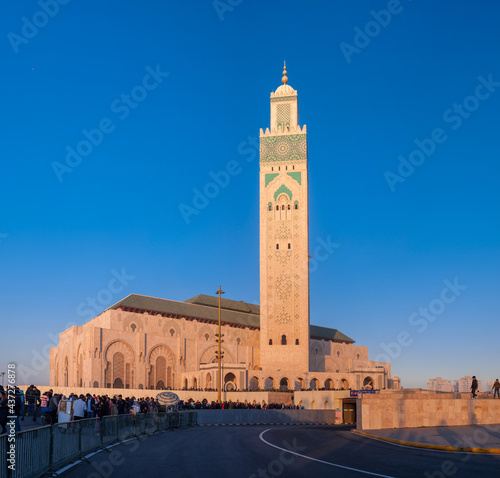 beautiful Islamic mosque on the ocean coast at sunset