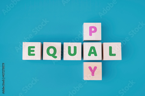 EQUAL PAY text on wooden blocks