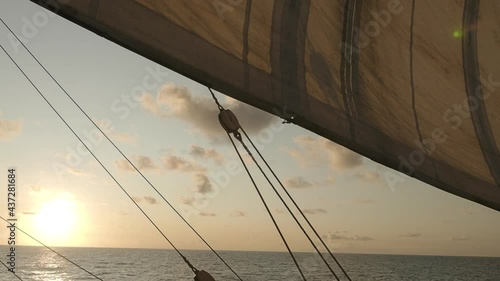 Wallpaper Mural Colorful sunset view from the ship in the open ocean. Sail and ropes on the deck. Torontodigital.ca