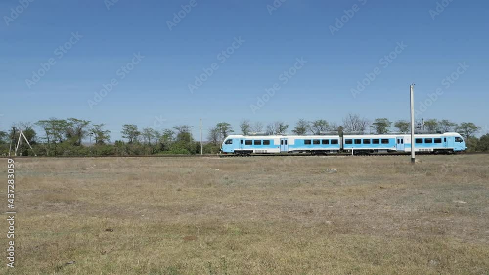 Blue train goes between the villages on the Crimean peninsula. Blue train goes between the villages on the Crimean peninsula.