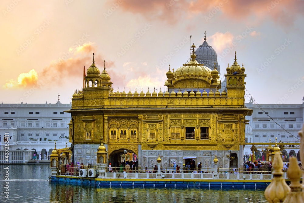 Amritsar, India : The Harmindar Sahib, also known as Golden Temple Amritsar. Sikhism religious place of worship. Sikh gurdwara Golden Temple during dramatic sunrise