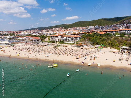 Panoramic view of resort in Sveti Vlas in Bulgaria. Summer holiday in Europe. From above view of beach in Sveti Vlas with sunbeds. Aerial photography, drone view.