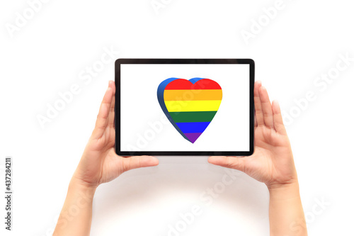 Free Download pride day celebration concept, with a tablet and a heart with the LGBT colors - GFXLoad