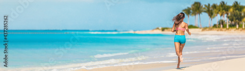 Fototapeta Naklejka Na Ścianę i Meble -  Athlete runner fitness woman running on Caribbean beach landscape banner panoramic background. Active exercise fit girl training cardio in summer lifestyle.