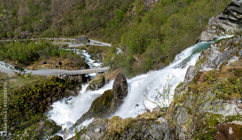 Kleivafossen near Briksdalsbreen, (Briksdal Glacier), one of the most accessible arms of the Jostedalsbreen Glacier in the municipality of Stryn in Vestland county, Norway. Kleivafossen near Briksdalsbreen, (Briksdal Glacier), one of the most accessible arms of the Jostedalsbreen Glacier in the municipality of Stryn in Vestland county, Norway.