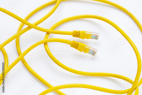 LAN network connection ethernet yellow cables on white