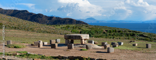 Stone table - sacrificial altar, ruins on the Island of Sun (Isla del Sol) on Titicaca lake in Bolivia photo