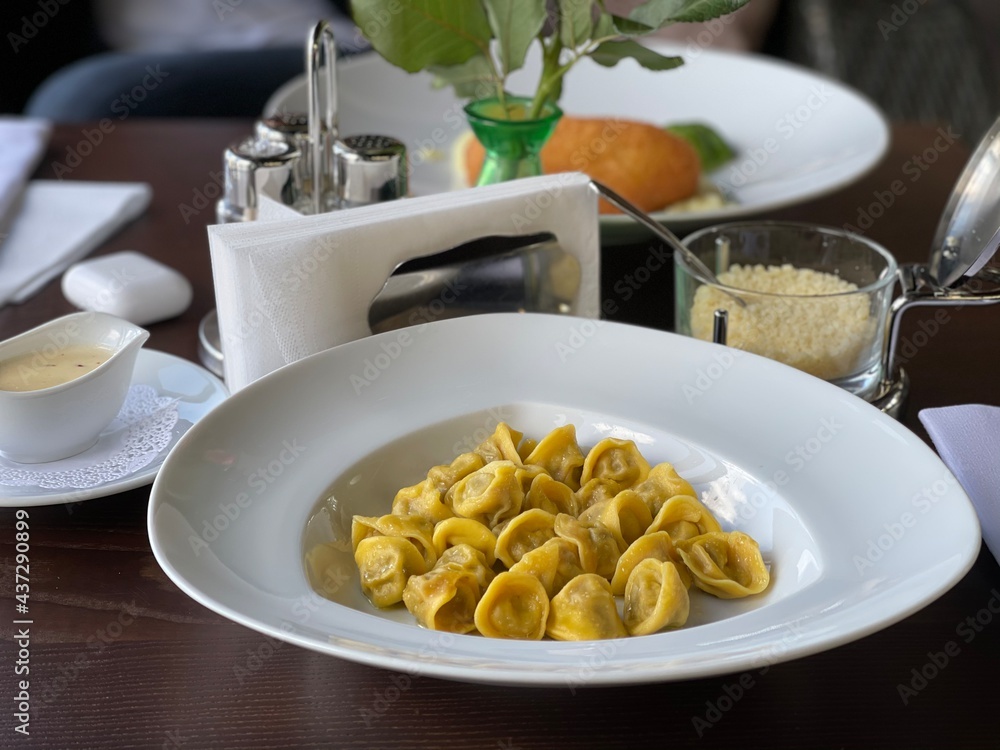 ravioli in a white plate in a cafe ravioli in a white plate in a cafe