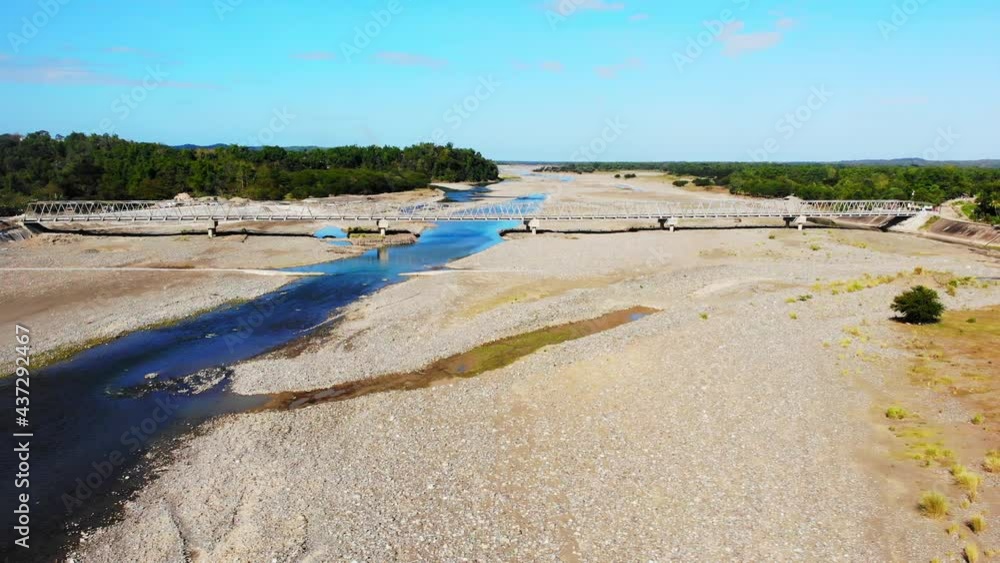 Bridge over drying river during summer in the Philippines Bridge over drying river during summer in the Philippines