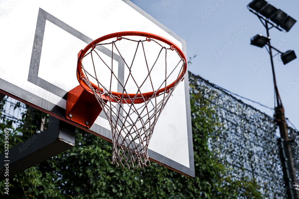 basketball hoop at the school stadium. college basketball sports basketball hoop at the school stadium. college basketball sports