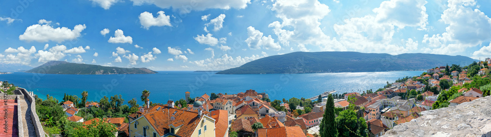 Summer view on houses with red roof and Bay of Kotor (Herceg Novi, Montenegro)