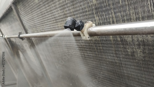 Cooling system for industrial heat exchangers. Industrial fan cooling tower.
Water spray nozzle close up