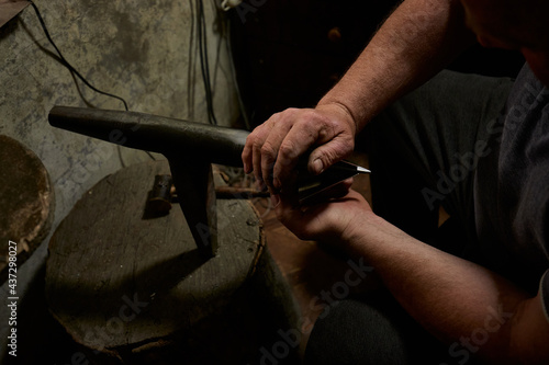 Silver making, handicraft, chasing and nielloing. Traditional work in the mountain village of Kubachi, Dagestan.