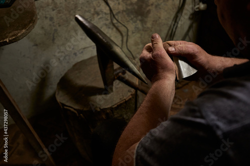 Silver making, handicraft, chasing and nielloing. Traditional work in the mountain village of Kubachi, Dagestan.