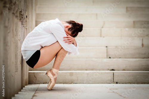 Ballerina cries on the tips.fear, sadness, classical dancer