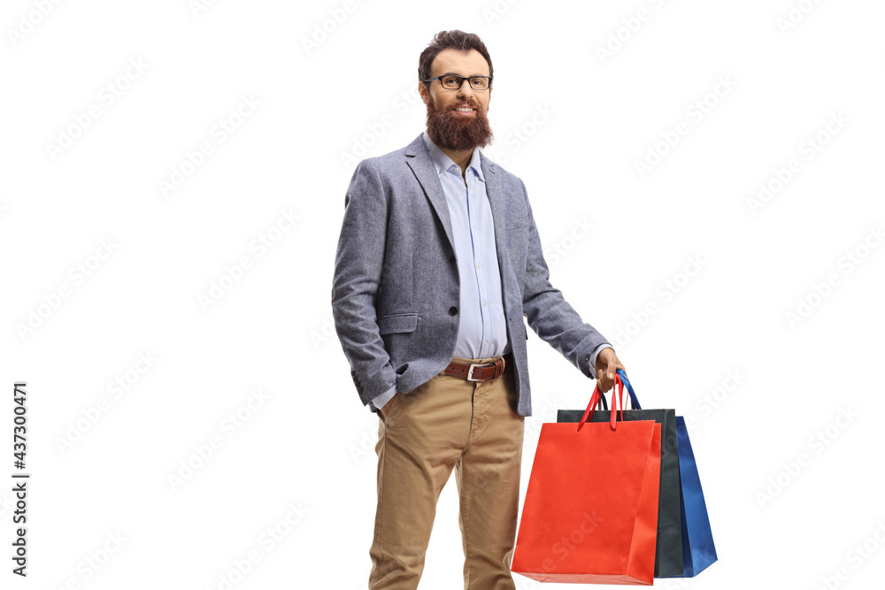 Young bearded man holding shopping bags Young bearded man holding shopping bags