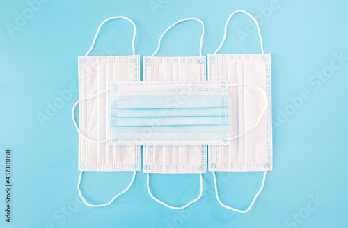  protective masks on a blue background.
