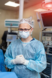 Doctor during surgery in operating room. Contemporary equipment in the operating room.