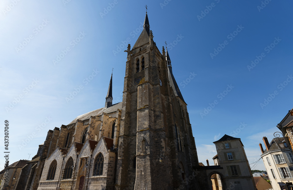 The main church of Dourdan is located just in front of the castle. Construction started in the 12th century, but the church kept being modified and repaired until the 17th. France.