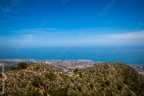Benalmádena teleferico shot from the top of Calamorro with city and coastline in the background. Andalusia, Spain. photo