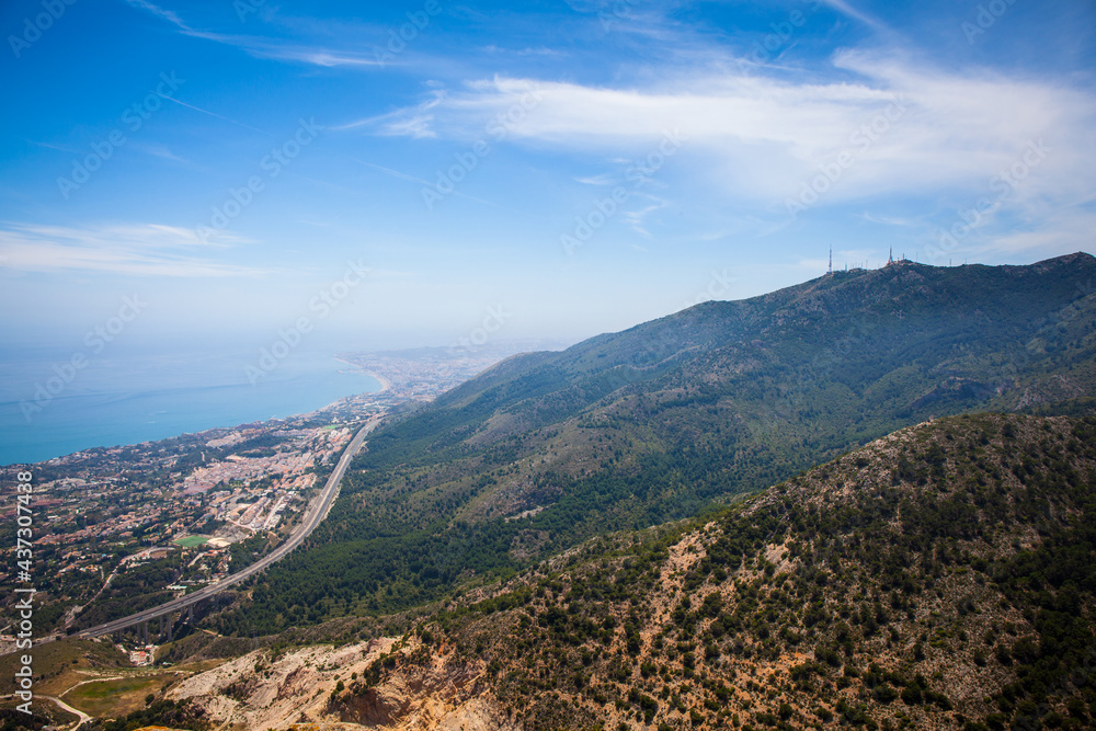 Benalmádena teleferico shot from the top of Calamorro with city and coastline in the background. Andalusia, Spain.