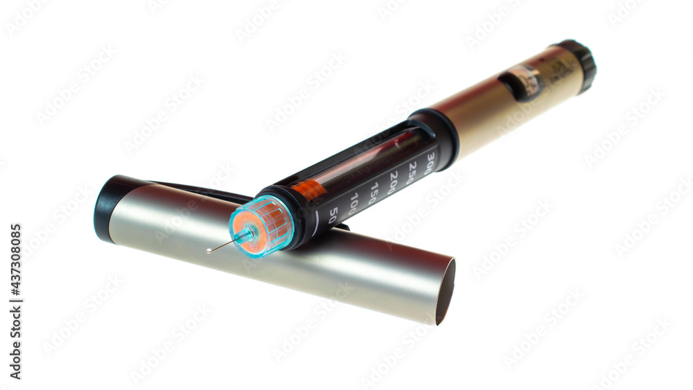 Insulin pen injector. Insulin pen fill with needle on white background. Diabetes Day. Insulin pen injector. Insulin pen fill with needle on white background. Diabetes Day.