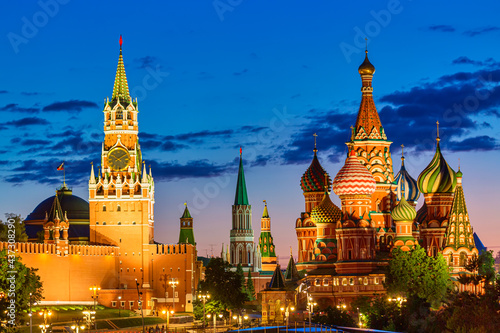 Beautiful sunset over the Kremlin wall towers and St. Basil Cathedral at the Red Square. Summer sunset in Moscow, Russia