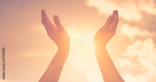 Hands up to the sky. Worship, hope, and spirituality concept. 