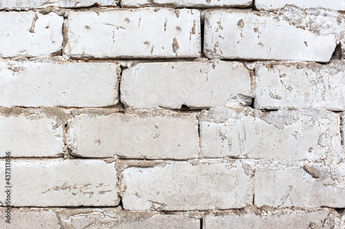 old brickwork made of white brick  vintage wall