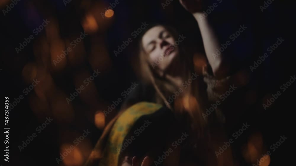 portrait of a girl at night on the background of the fire portrait of a girl at night on the background of the fire