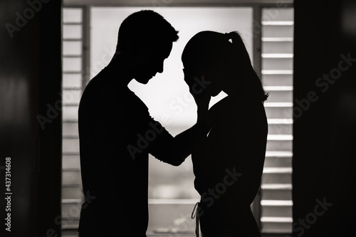 Εκτύπωση καμβά Young man comforting his sad crying depressed female friend showing his support