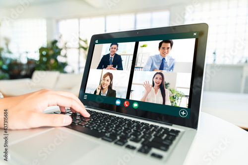 business team using laptop for a online meeting in video call