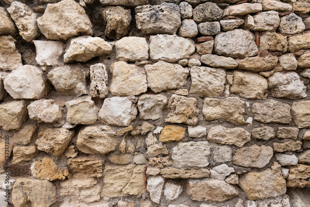 Old masonry of stones. Old stone and old masonry close-up. Old masonry of stones. Old stone and old masonry close-up.