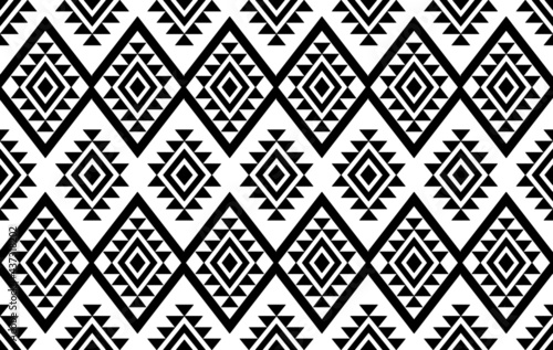 Ikat ethnic Indian seamless pattern design. Aztec fabric carpet mandala ornament native boho chevron textile decoration. Geometric embroidery African American vector illustrations background.