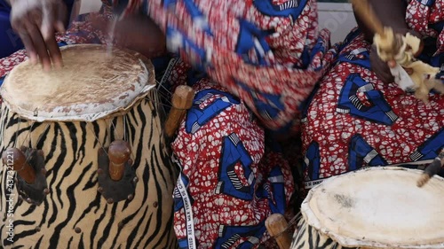 Traditional music Ashanti drummers Kumas Ghana Africa. Traditional cultural music instruments, drums, for dancing and entertainment. Culture African celebration demonstration. Typical dance. photo