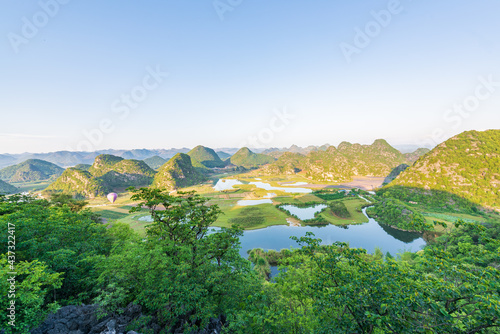 Sunny morning scenery in Puzhehei, Yunnan, China photo