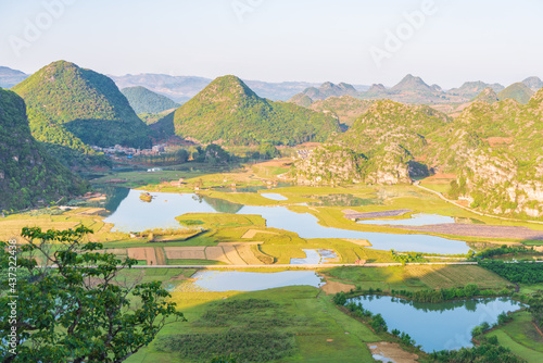 Sunny morning scenery in Puzhehei, Yunnan, China photo