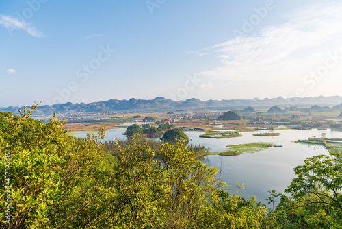 Sunny morning scenery in Puzhehei, Yunnan, China photo