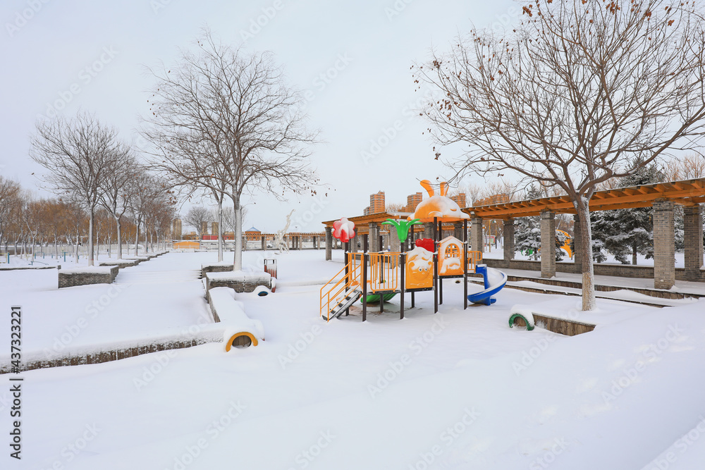 Children's playground in snow, North China