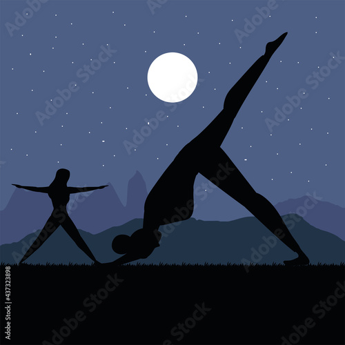 night silhouette women yoga