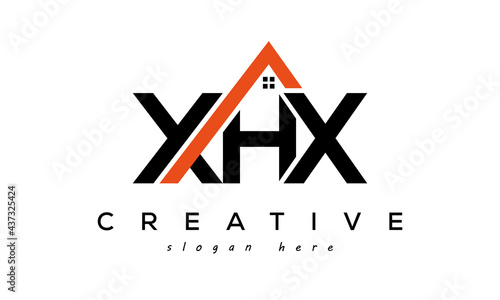 initial XHX letters real estate construction logo vector photo