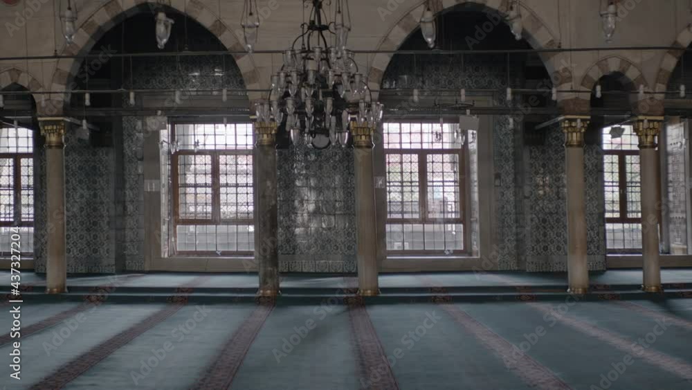 A great hall has a large windows against the wall A great hall has a large windows against the wall